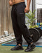 Muscle Nation Bottoms Essential Trackies - Black