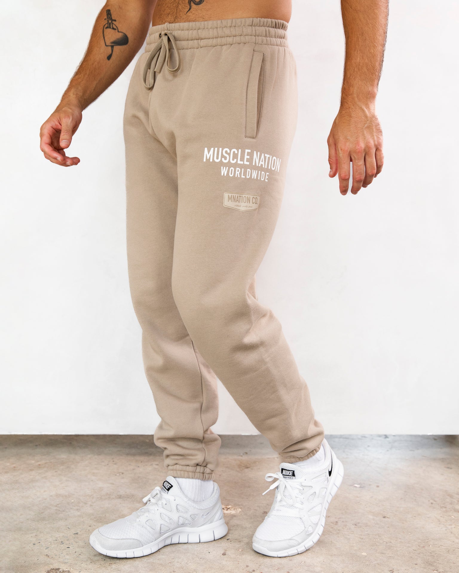 Muscle Nation Men's Track Pants Worldwide Trackies - Fossil