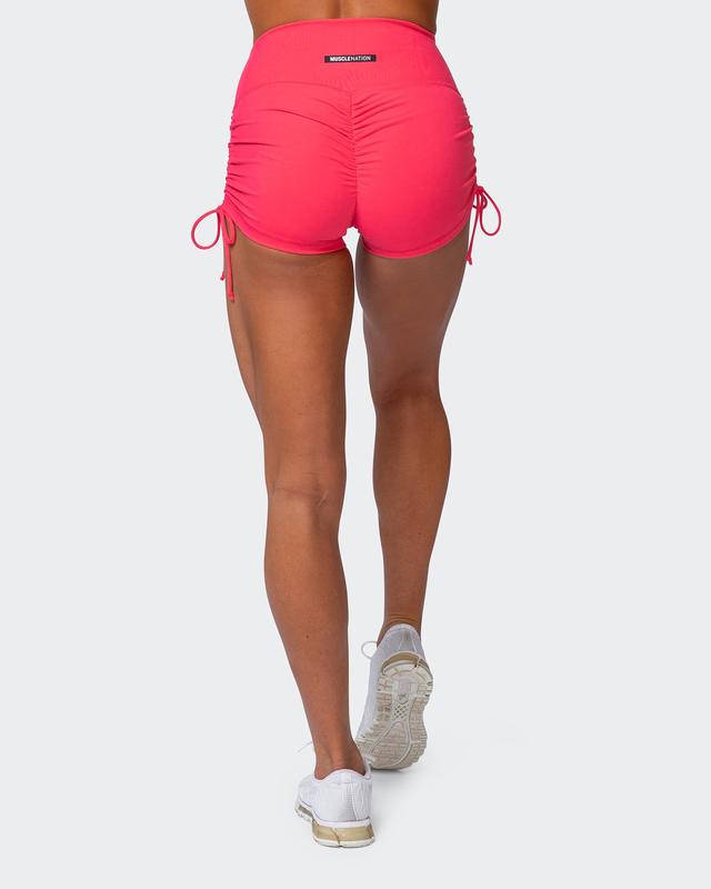 musclenation SIGNATURE SCRUNCH TIE UP BOOTY SHORTS Paradise Pink