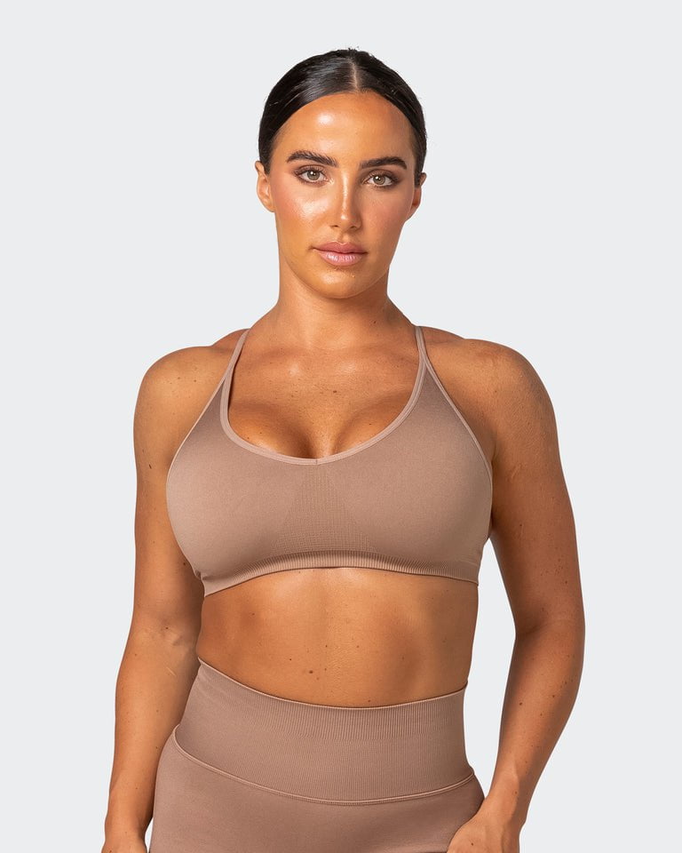 https://www.beactivewear.com.au/cdn/shop/products/musclenation-sports-bras-mn-definition-seamless-bra-biscuit-37786607943849_768x960.jpg?v=1680089987